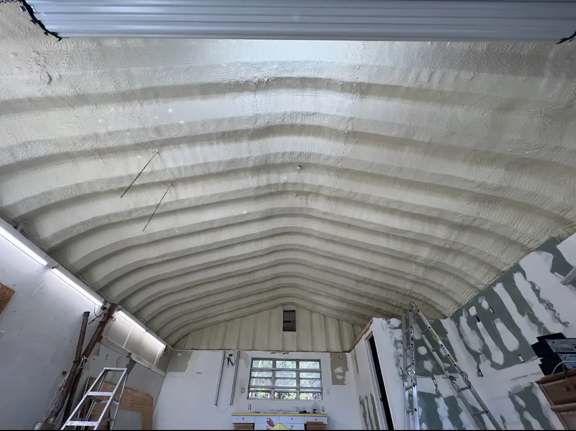 Spray polyurethane foam applied to the underside of a metal roof deck in Loma Linda